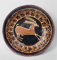Staffordshire slipware dish decorated with a stag